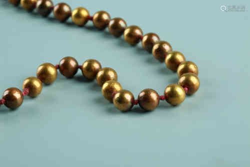 A Chinese Bronze Beads String