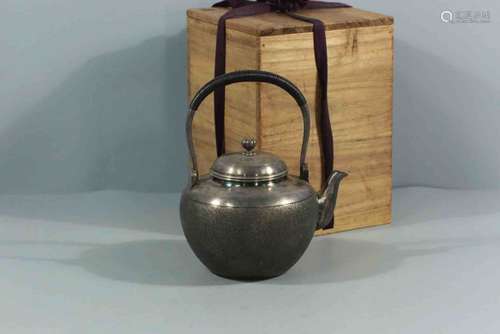 A Japanese Silver Hoop-handled Kettle