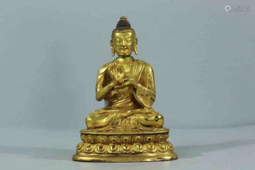 A Bronze Gilding Sitting Sakyamuni Statue