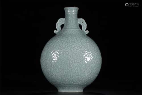 A Chinese Celadon Glazed Carved Porcelain Flask