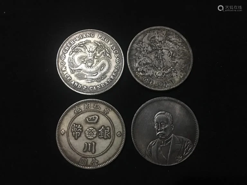 Group of 4 Chinese Coins