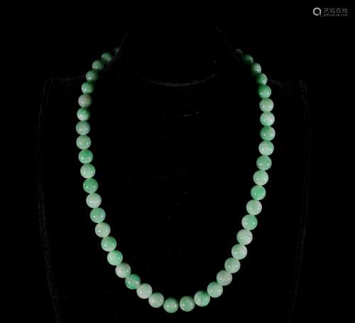 A Chinese Jadeite Bead