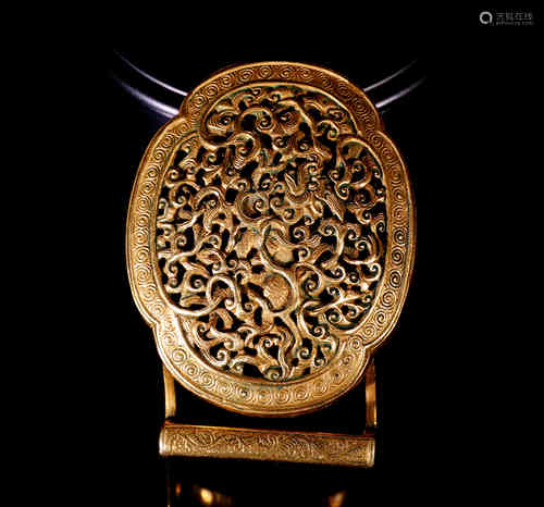 A Chinese Gilt Bronze Belt Buckle with Dragon Carving