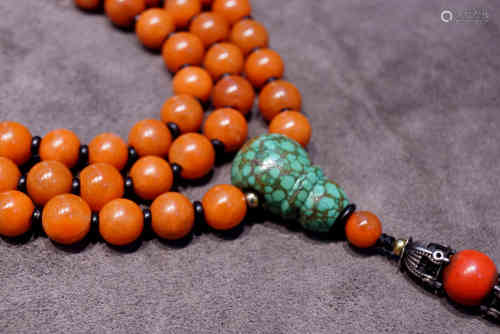 A Chinese Carved Nanjiang Red Agate Prayers Beads