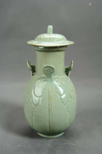 A Chinese Carved Porcelain Hat-covered Jar