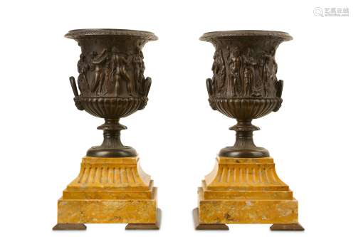 A PAIR OF LATE 19TH CENTURY FRENCH BRONZE AND SIENNA MARBLE URNS ON STANDS of Campana form, with