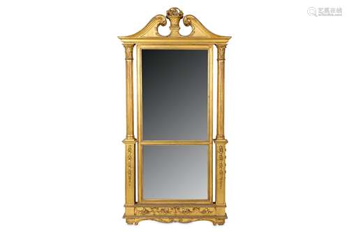 AN EARLY 19TH CENTURY GILTWOOD MIRROR carved on both sides, with scrolling swan neck pediment