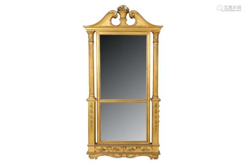 AN EARLY 19TH CENTURY GILTWOOD MIRROR carved on both sides, with scrolling swan neck pediment