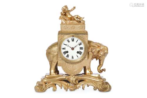 A LATE 19TH / 20TH CENTURY LOUIS XVI STYLE GILT BRONZE CLOCK MODELLED WITH AN ELEPHANT the