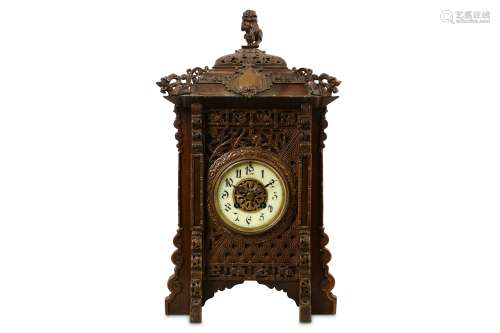 A LATE 19TH CENTURY FRENCH JAPONISME STYLE MAHOGANY, GILT BRASS AND IVORY INLAID MANTEL CLOCK the