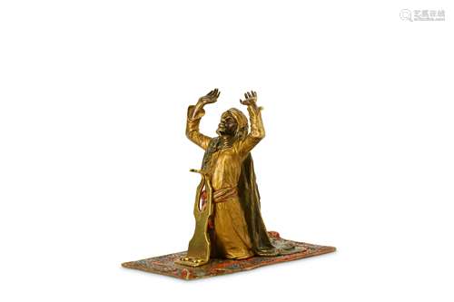 FRANZ BERGMAN (AUSTRIAN, 1861-1936): A COLD PAINTED BRONZE FIGURE OF AN ARAB MAN PRAYING the