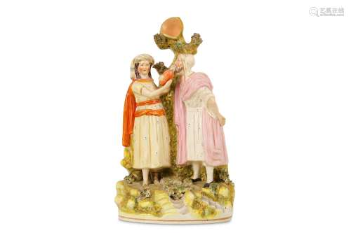 A 19TH CENTURY ENGLISH STAFFORDSHIRE POTTERY FIGURE OF REBECCA AND ELIEZER AT THE WELL, MADE FOR THE