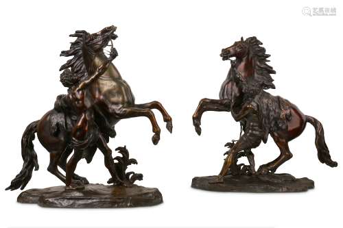 AFTER GUILLAUME COUSTOU (FRENCH, 1677-1746): A LARGE PAIR OF 19TH CENTURY BRONZE MODELS OF THE