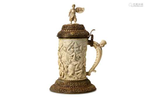 A MAGNIFICENT 9TH CENTURY GERMAN IVORY TANKARD WITH PARCEL GILT MOUNTS DEPICTING AN OTTOMAN