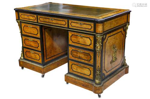 A VICTORIAN BURR WALNUT, OLIVEWOOD AND EBONISED PEDESTAL DESK IN THE MANNER OF HOLLAND & SONS with