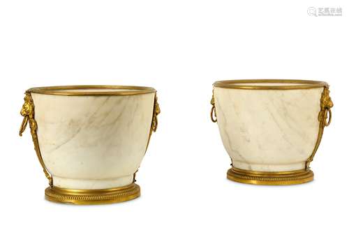 A PAIR OF 19TH CENTURY FRENCH REGENCE STYLE MARBLE AND GILT BRONZE MOUNTED JARDINIERES the white and