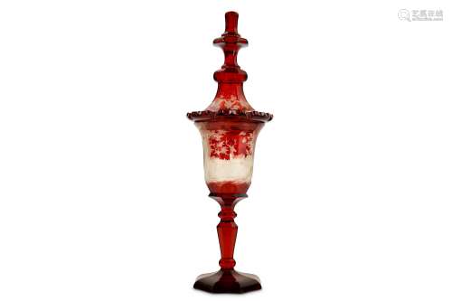 A LARGE AND IMPRESSIVE MID 19TH CENTURY BOHEMIAN RUBY GLASS GOBLET AND COVER the faceted cover