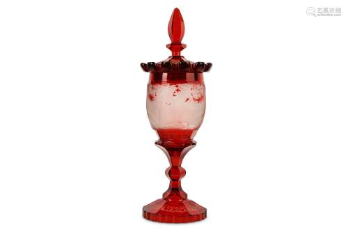 A LARGE MID 19TH CENTURY BOHEMIAN RUBY GLASS GOBLET AND COVER the faceted cover surmounted by a