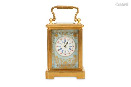 A GILT BRASS AND PORCELAIN MOUNTED MINIATURE CARRIAGE CLOCK