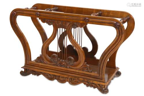 AN UNUSUAL LATE REGENCY ROSEWOOD MUSIC ROLL HOLDER CIRCA 1820 the scrolling frame centred by a