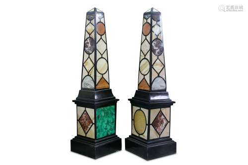 A LARGE PAIR OF FLOOR STANDING SPECIMEN MARBLE OBELISKS decorated throughout with various marbles