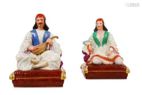 A PAIR OF 19TH CENTURY FRENCH PORCELAIN FIGURAL INCENSE HOLDERS OF SEATED GREEK MUSICIANS ATTRIBUTED