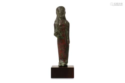 A 6TH CENTURY B.C. ETRUSCAN BRONZE KORE FIGURE raised on a later stained wood base, the figure 10cm
