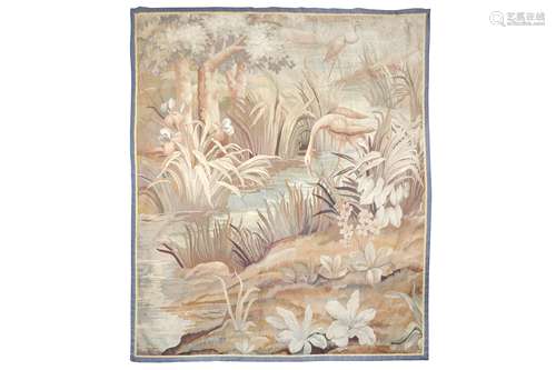 A LATE 18TH CENTURY FLEMISH VERDURE TAPESTRY DEPICTING STORKS AMONGST TREES one stork drinking