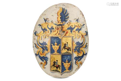A MID 18TH CENTURY GERMAN OR DUTCH PAINTED METAL HERALDIC CREST painted and gilt decorated on a