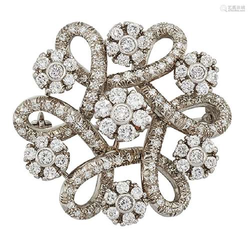 A diamond brooch, of single-cut diamond looped hexafoil design set with a series of brilliant-cut