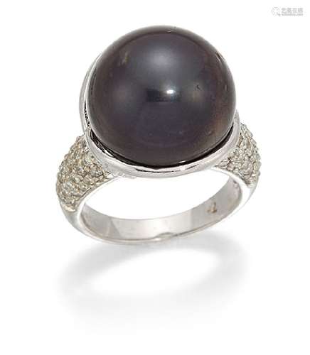 A black cultured pearl and diamond ring, the cultured pearl, diameter approximately 15.6mm, in