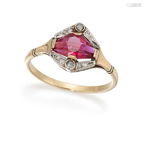 A synthetic ruby and diamond ring, the fancy shaped synthetic ruby set between two rose-cut