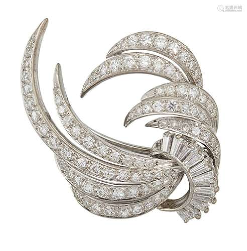 A diamond brooch, of circular and single-cut diamond scrolling spray design with tapered baguette-