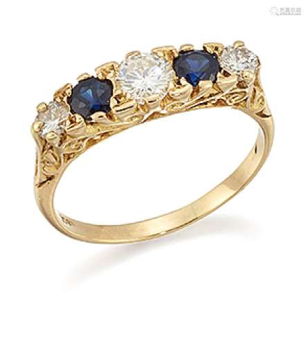 A diamond and sapphire five stone ring, of half-hoop design comprising three graduated brilliant-cut