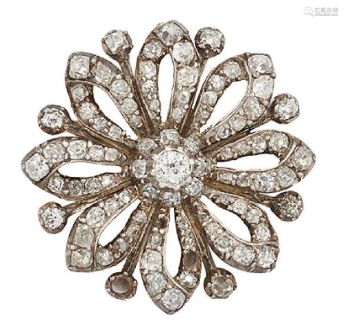 A late 19th century diamond brooch, of openwork stylised flowerhead design with central diamond