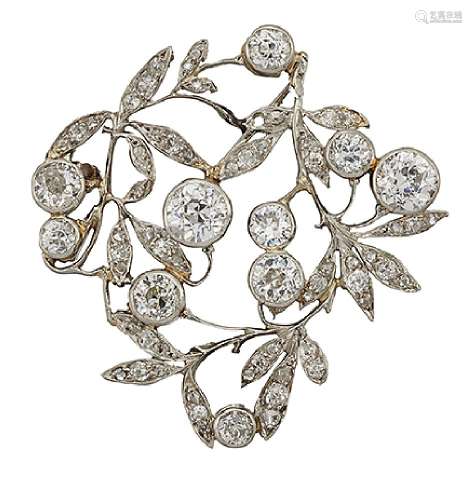 A Belle Epoque diamond brooch, designed as an openwork floral cluster spray set with old-brilliant-
