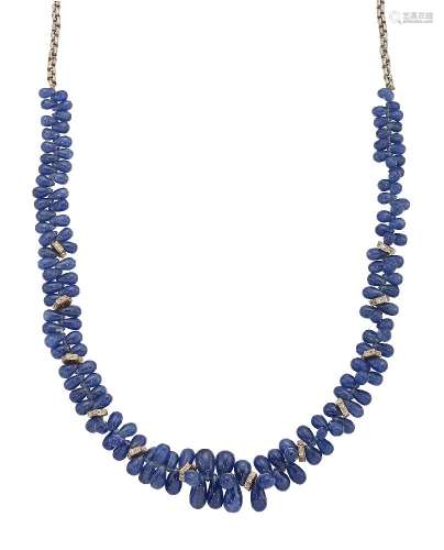 A sapphire and diamond necklace, of torsade type, composed of a line of graduated pear shaped
