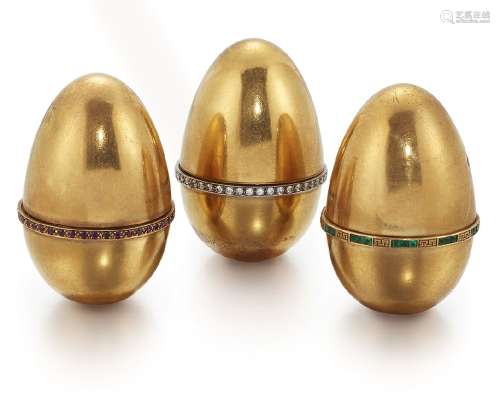 Three 18ct gold diamond and gem egg design ornamental novelty boxes, with screw fittings, each egg