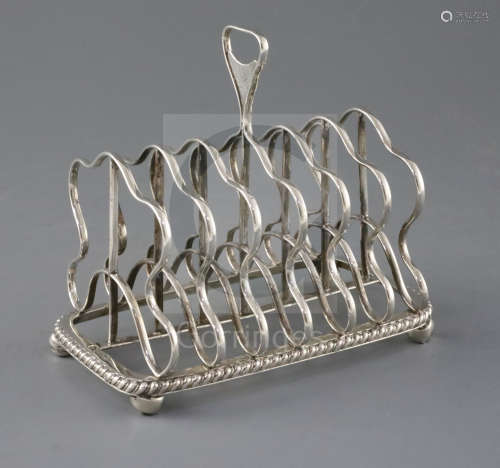 A George III silver seven bar toastrack, by Battie, Howard & Hawksworth?, of rectangular form,