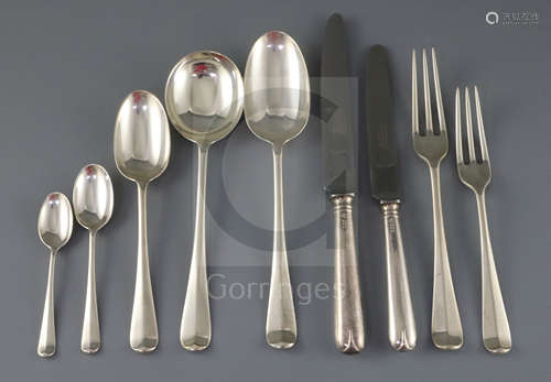 A 1970's canteen of Garrard & Co hanovarian rat tail pattern cutlery for twelve, comprising one