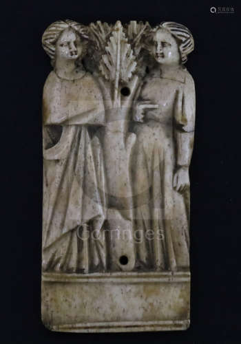 An Italian bone relief plaque, possibly Embriachi workshop, c.1390-1410, depicting two gowned
