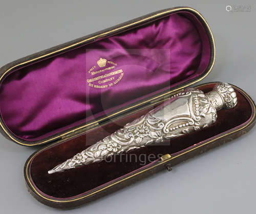 A late Victorian repousse silver mounted scent bottle, in Goldsmith & Silversmith box, by Horton and