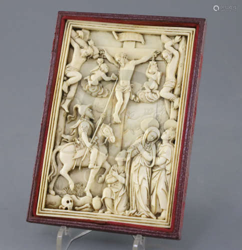 A Hispano-filipino or Sino-Portuguese ivory relief of The Crucifixion with the two thieves, probably