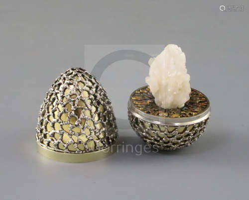 A late 1960's parcel silver gilt 'surprise' egg by Stuart Devlin, with stylised cagework decoration,