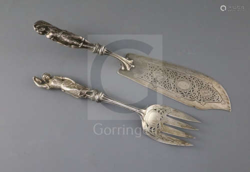 A pair of Victorian silver fish servers, with cast figural handles modelled as a fisherman and his