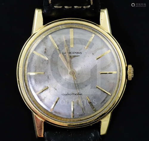 A gentleman's early 1960's 18ct gold Longines automatic wrist watch, with baton numerals, movement