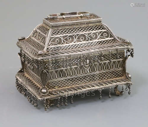 A 19th century Indian silver filigree casket, of rectangular form, on pierced scroll feet, plaque on