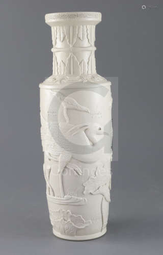 A Chinese white glazed moulded rouleau vase, Wang Bingrong seal mark, decorated in high relief
