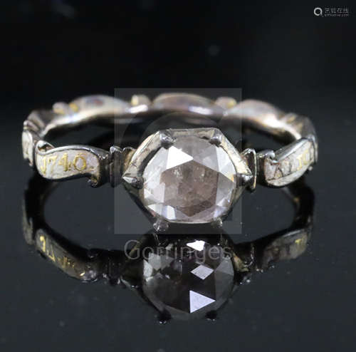 A George II gold, white enamel and rose cut diamond set mourning ring, with rock crystal panel en