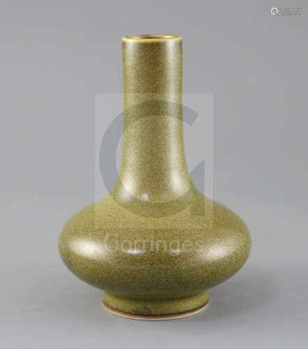 A Chinese teadust glazed bottle vase, H.17cm